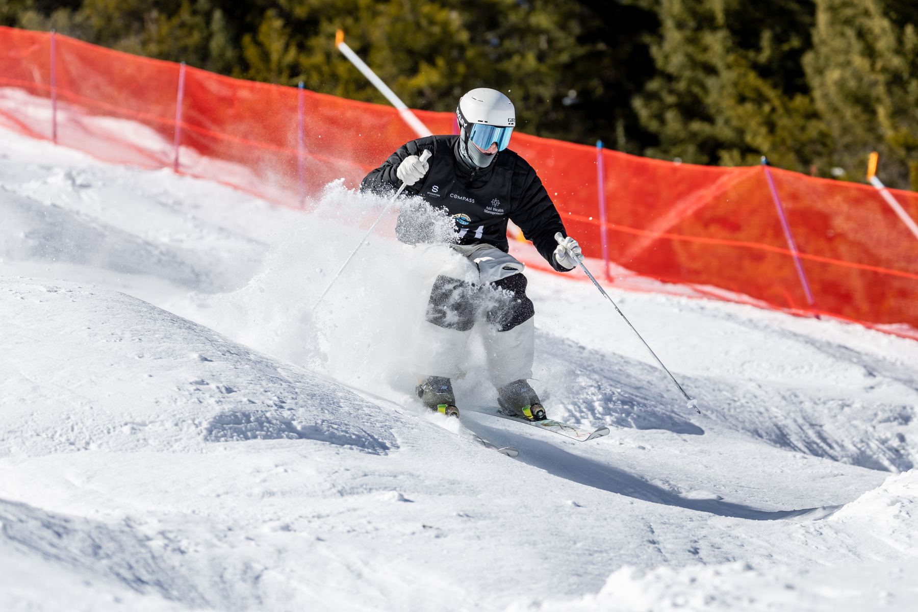Hugh skiing a mogul run