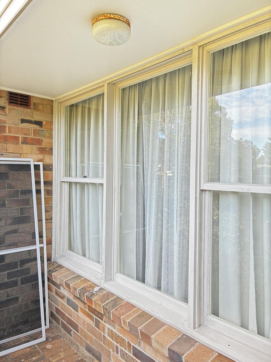 Clean sash windows on a verandah